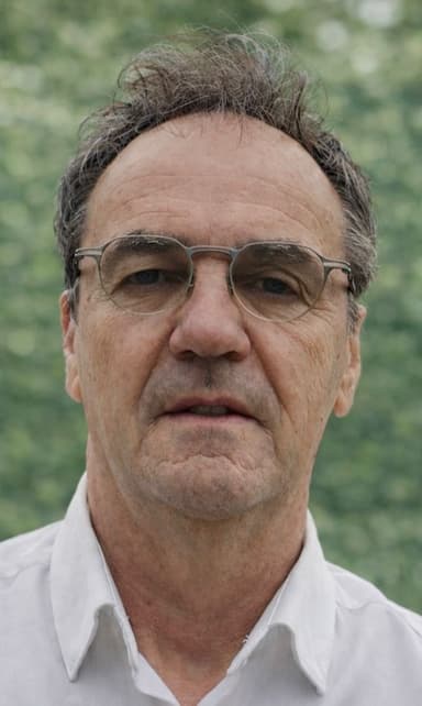 Portrait de Thierry Homeyer en situation professionnelle, souriant et confiant