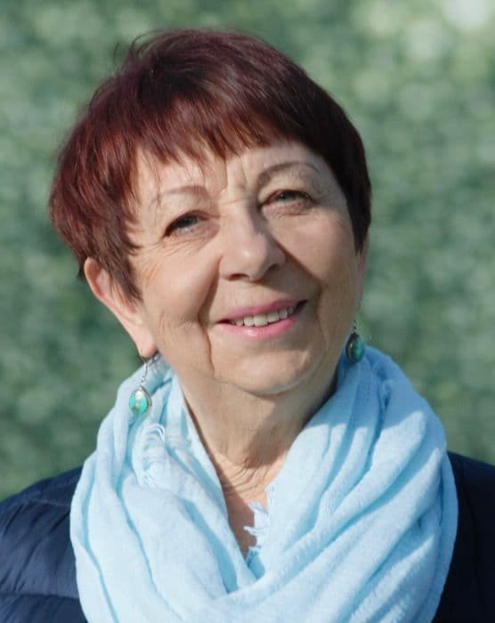 Portrait de Mireille Thouilleux en situation professionnelle, souriant et confiant